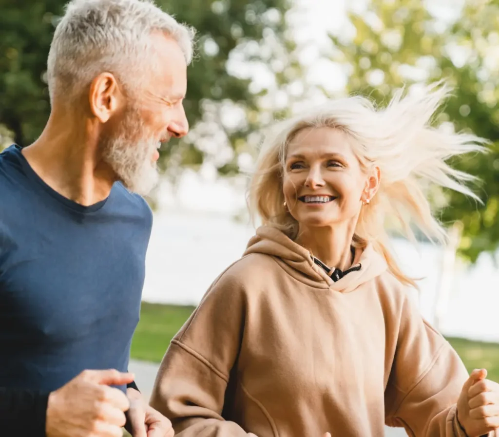 mature couple running