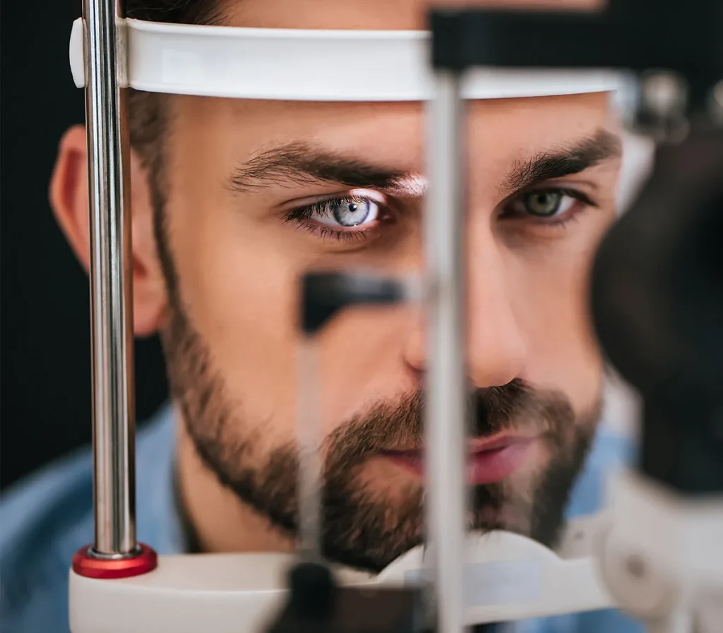 young man at the ophthalmologist checking retina