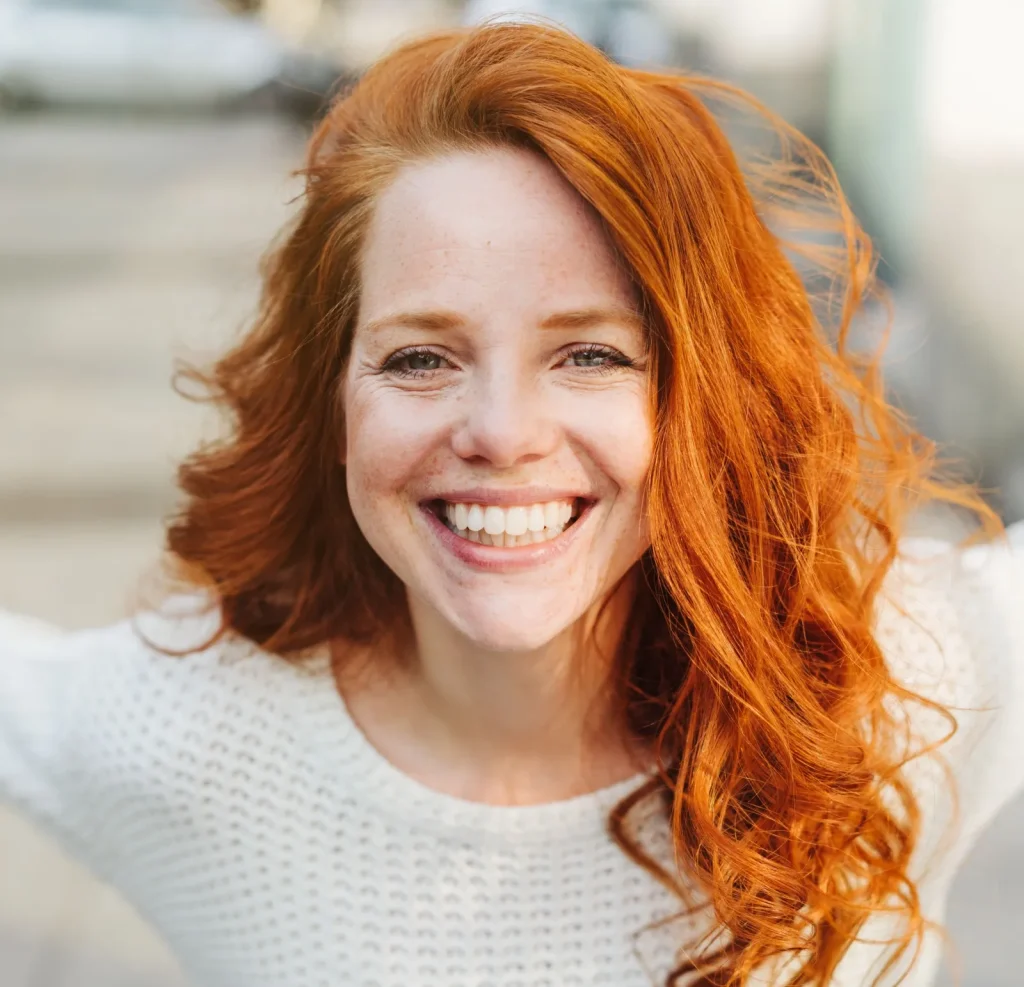 happy young woman smiling after lasik