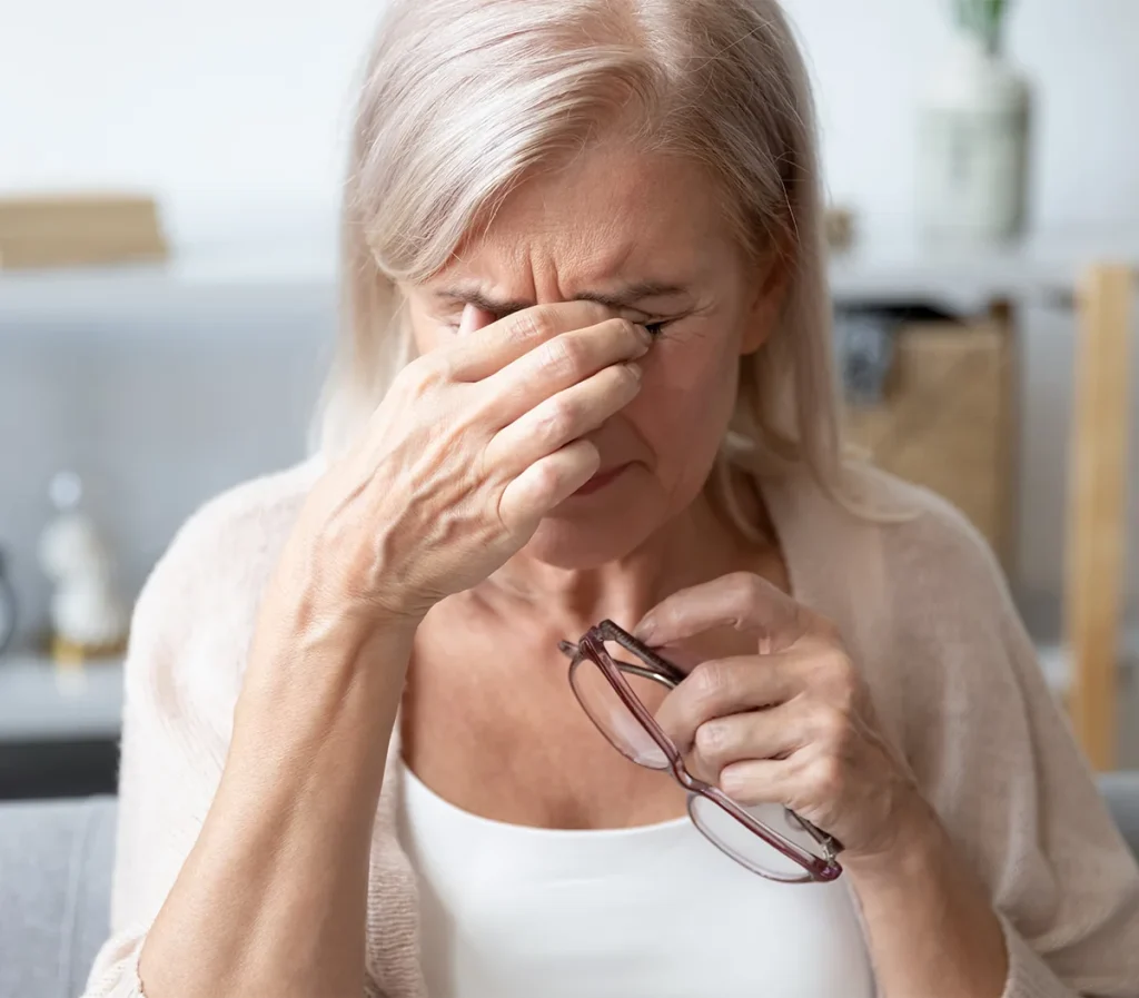 Elderly woman with itchy and painful eyes